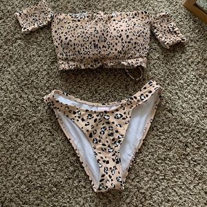 Xhileration swimsuit, medium bottoms, D top. NWOT